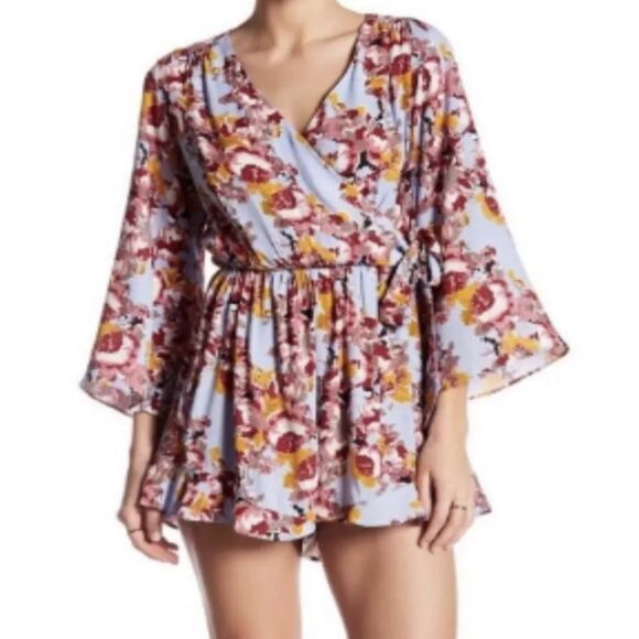 ASTR The Label Blue Floral Side Wrap Romper size XS with Pockets Boho Chic - Picture 1 of 11